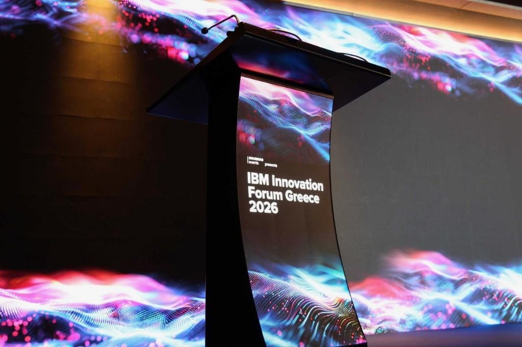 Unified stage look: LED podium and LED wall sharing branding at IBM Innovation Forum Greece 2026