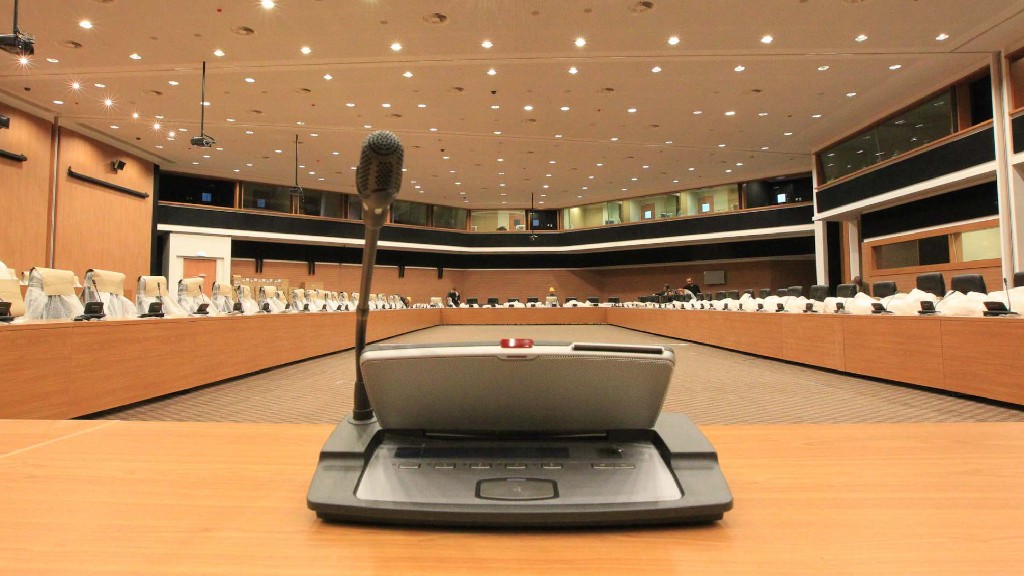 Conference microphones and a large multi-seat assembly hall