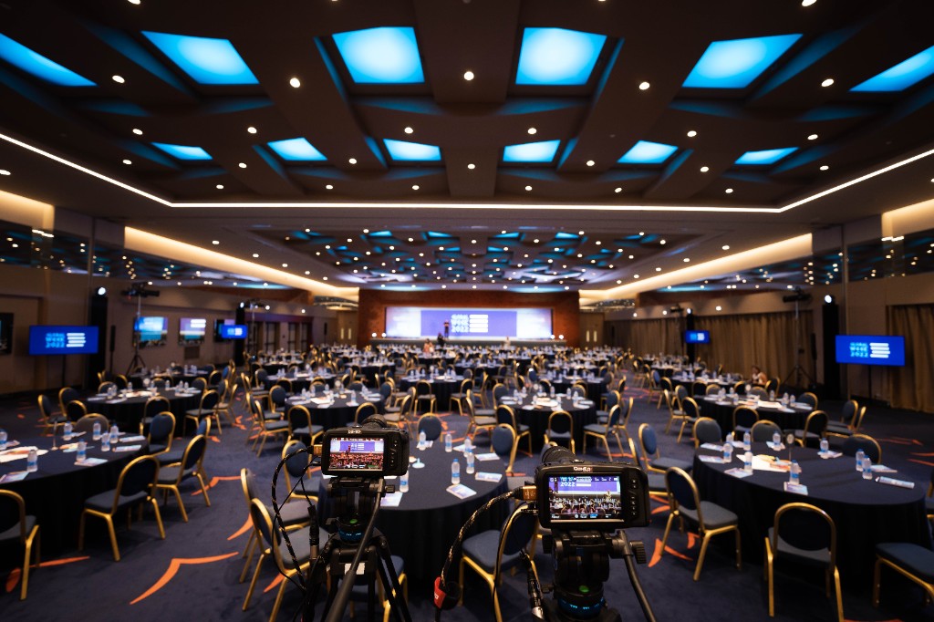 Multi-camera production in a conference ballroom with LED backdrop